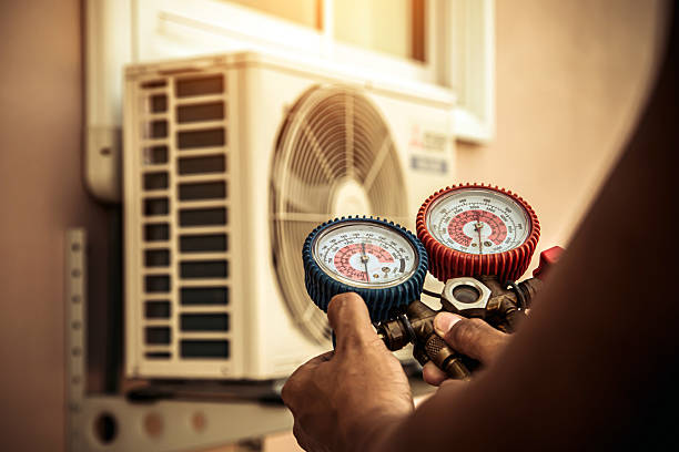 Professional Air Conditioning Service technician working in Palos Park, IL